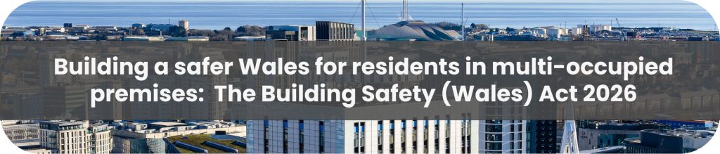 Aerial view of a Welsh coastal city with text: Building a safer Wales for residents in multi-occupied premises: The Building Safety (Wales) Act 2026