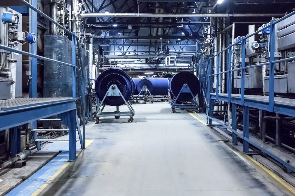 Rolls of dyed fabric on the RTS Textiles production floor